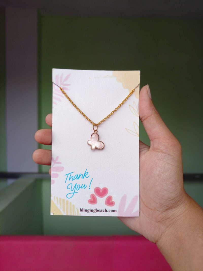 Pink butterfly necklace